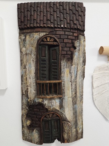 Scultura murale legno - in,