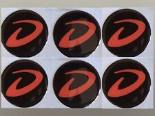 ADESIVO COPRICERCHI IN LEGA