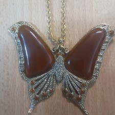 collana bigiotteria con pendaglio farfalla ottime condizioni