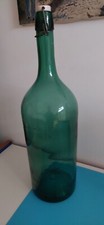 Antico bottiglione vetro verde e tappo in ceramica h. 56 cm. primi anni del 900