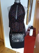 Chanel timeless chain around