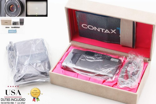 Fotocamera compatta a - ⏯,