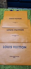 3 buste di carta Louis Vuitton