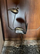 Scultura in ferro raffigurante un fenicottero