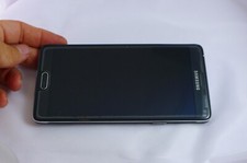 Smartphone Samsung Galaxy Note 4 SM-N910 non testato senza batteria per ricambi lcd