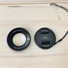 Lente e copriobiettivo