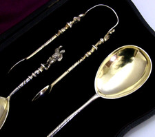 CUCCHIAIO E PINZE PER