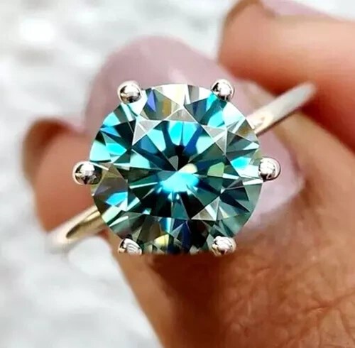 Anello solitario tondo