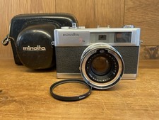 Quasi Mint W/Custodia Minolta