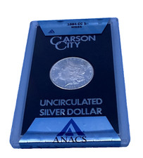 1884-CC $1 Morgan dollaro d'argento GSA ANACS MS-65