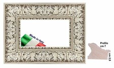 Cornice bianca e argento