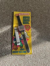 Orologio gioco Nintendo Nelsonic Super Mario Luigis Hammer Toss come nuovo in confezione.