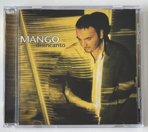 Mango disincanto cd - –,