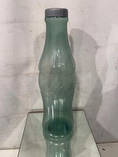 Bottiglia salvadanaio pubblicitario Coca Cola