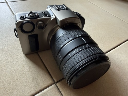 Canon eos sigma - +,