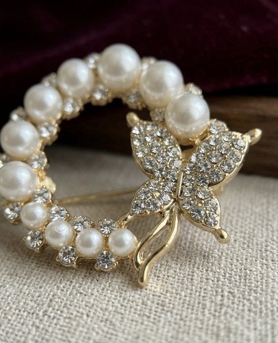 Elegante spilla dorata - elegante,