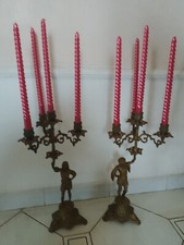 COPPIA CANDELABRI CON CANDELE GRANDI ANTICHI IN OTTONE PIENO