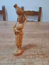 Scultura in legno di ulivo, La