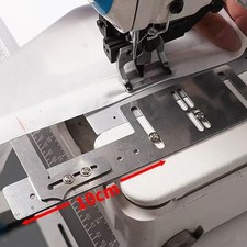 Guida per cucitura regolabile