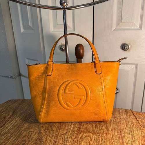 Gucci orange small leather - gucci,