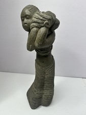 Scultura in pietra 15" di una