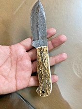 Coltello in acciaio damascato