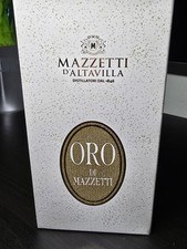 Grappa Con Oro Dentro