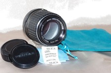 Objectif 135mm f3,5 SMC PENTAX avec bouchons d'origine, pare-soleil, housse TBE