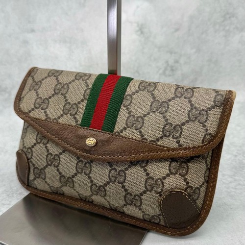 Gucci pouch supreme leather - gucci,