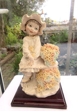Statuina venditore fiori