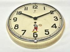 Orologio vintage da parete da muro a carica manuale in metallo anni 50 tedesco