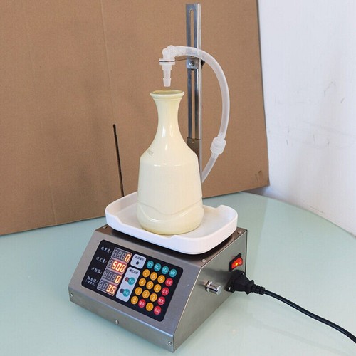 Riempitrice bottiglie liquide - riempitrice,