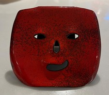 Maschera in rame sbalzato e