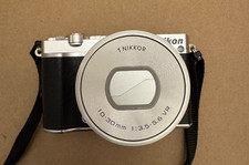 Nikon 1 J5 argento 20,8