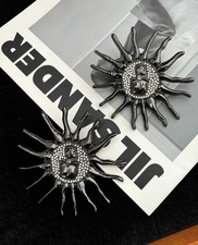 Orecchini sole stella cinque