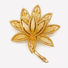 Avon spilla dorata con fantasia di foglie stile Trifari Coro anni '60