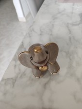 Elefante cuore dorato fuori - elefante,