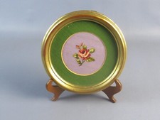 Quadro rotondo fiore rosa