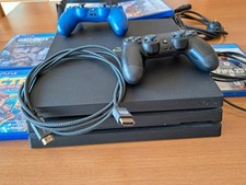 Sony PS4 pro + 5 giochi originali + borsa personalizzata + 2 joystick + cavi