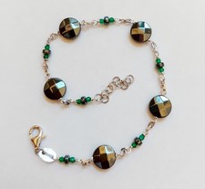 Bracciale in argento 925 con ematite a disco sfaccettato e zirconia cubica verde
