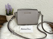 Borsa messenger media MICHAEL