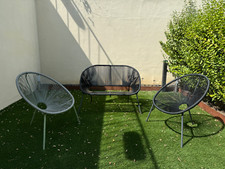 salotto da giardino con divanetto e due poltrone color nero e verde salvia 