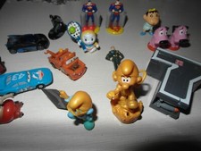 Sorpresine Kinder superhero Puffi gold 7 trasform doraemon batman superman Leone