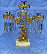 Antico candelabro a prisma