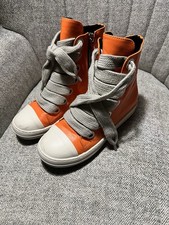 Sneakers alte arancioni lacci