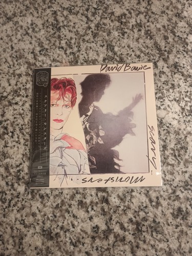 Scary monsters david bowie - by,