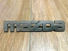 MAZDA 139MM LOGO SIGLA EMBLEMA FREGIO STEMMA SCRITTA TARGHETTA BADGE PLACCA NOME
