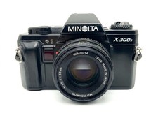 Minolta 300s 50 mm - +,