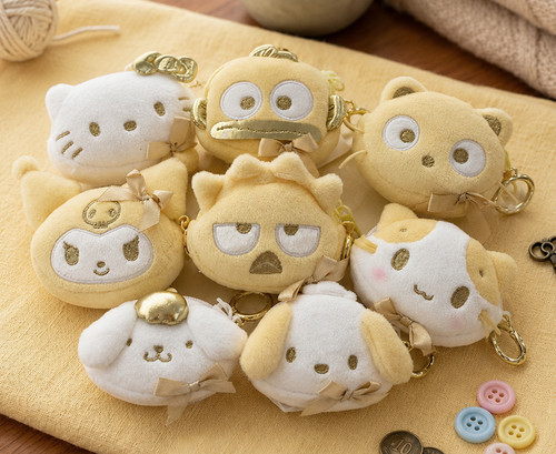 Sanrio gold mini pouch - gold,