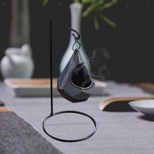 Scalda olio a forma di goccia